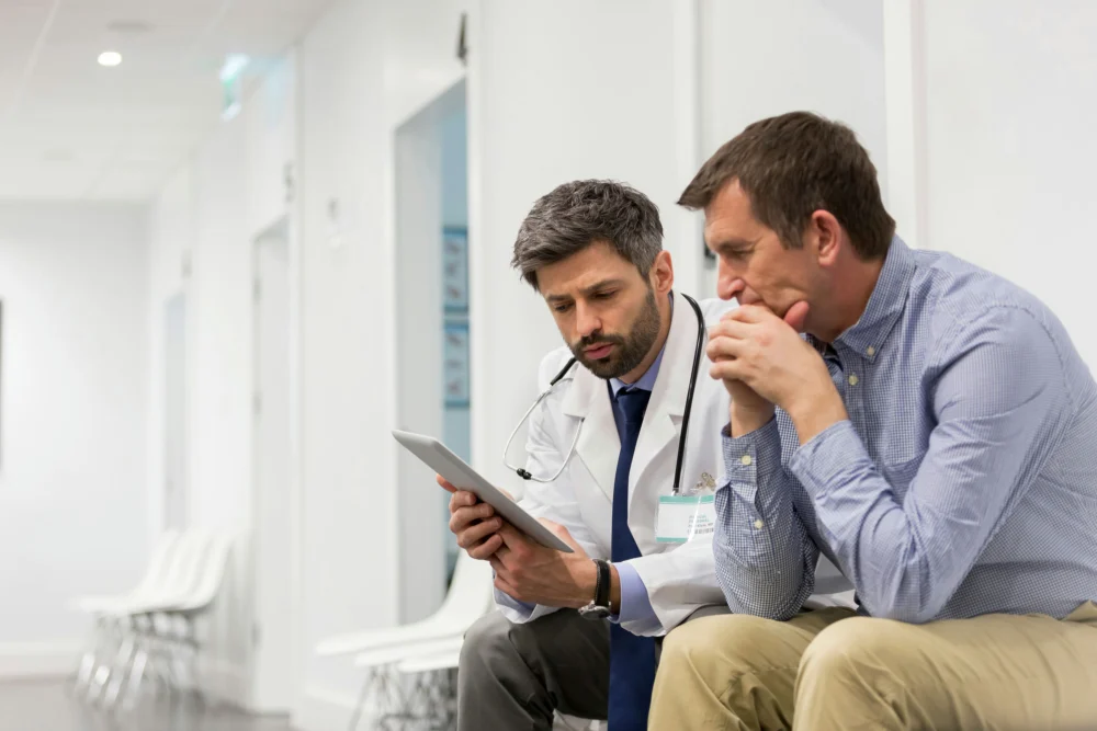 Patient reviewing results with his counselor during a meth addiction treatment session in Memphis, Tennessee. Patient reviewing results with his counselor during a meth addiction treatment session in Memphis, Tennessee.