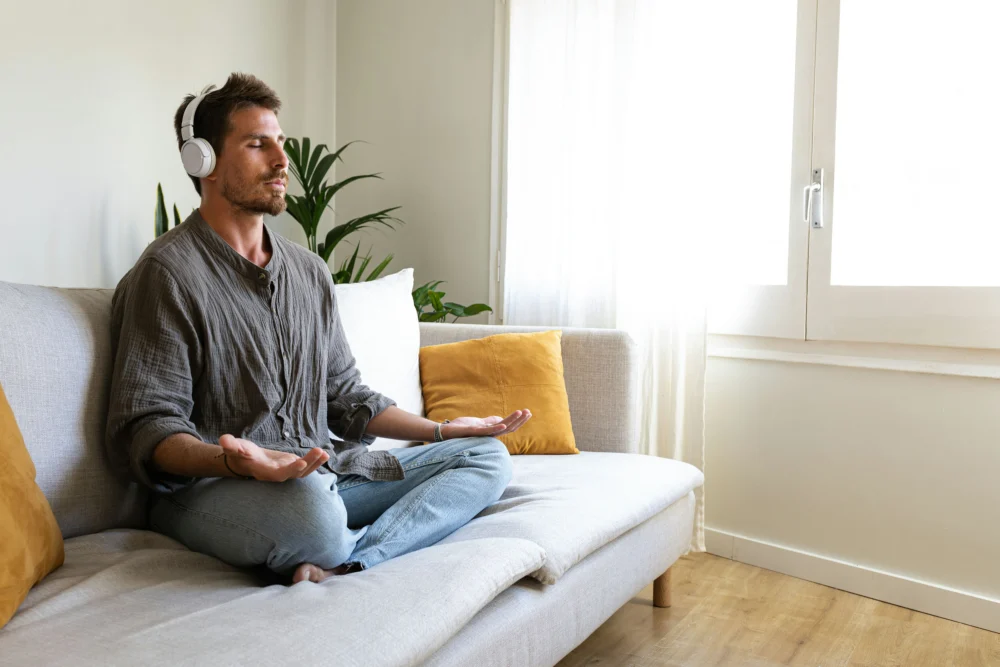 man doing yoga for addiction recovery