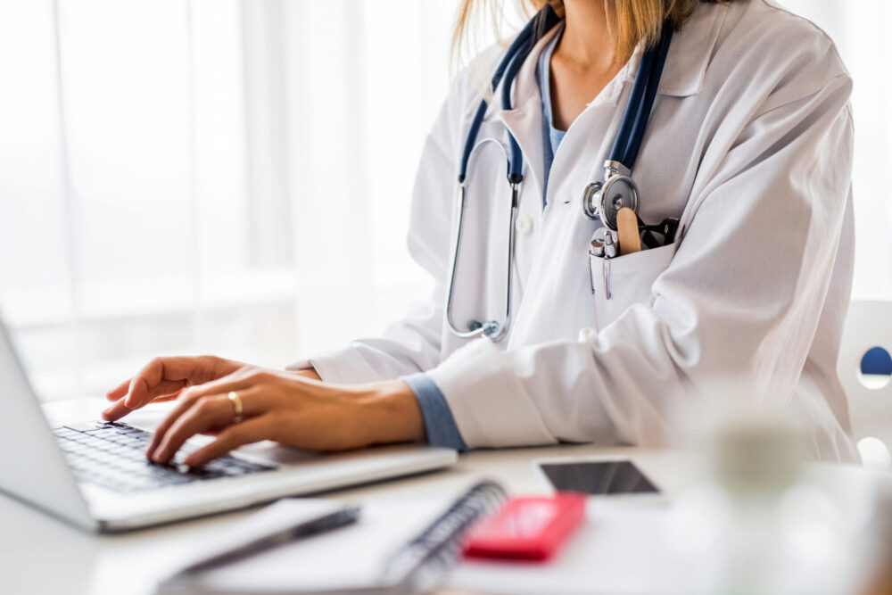therapist assessing a patient in aftercare